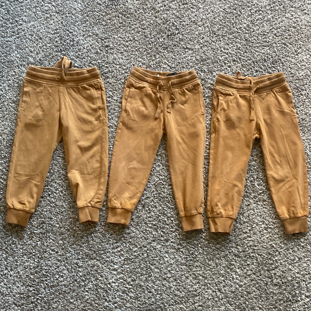 Toddler boy, drawstring, tan sweat pants.
